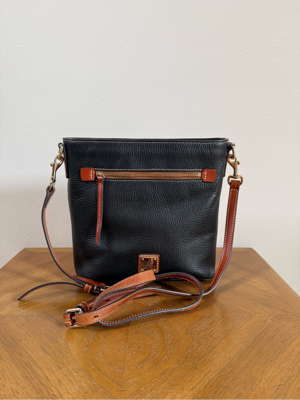Dooney & Bourke Black Pebble Grain Leather Crossbody with Brown Trim